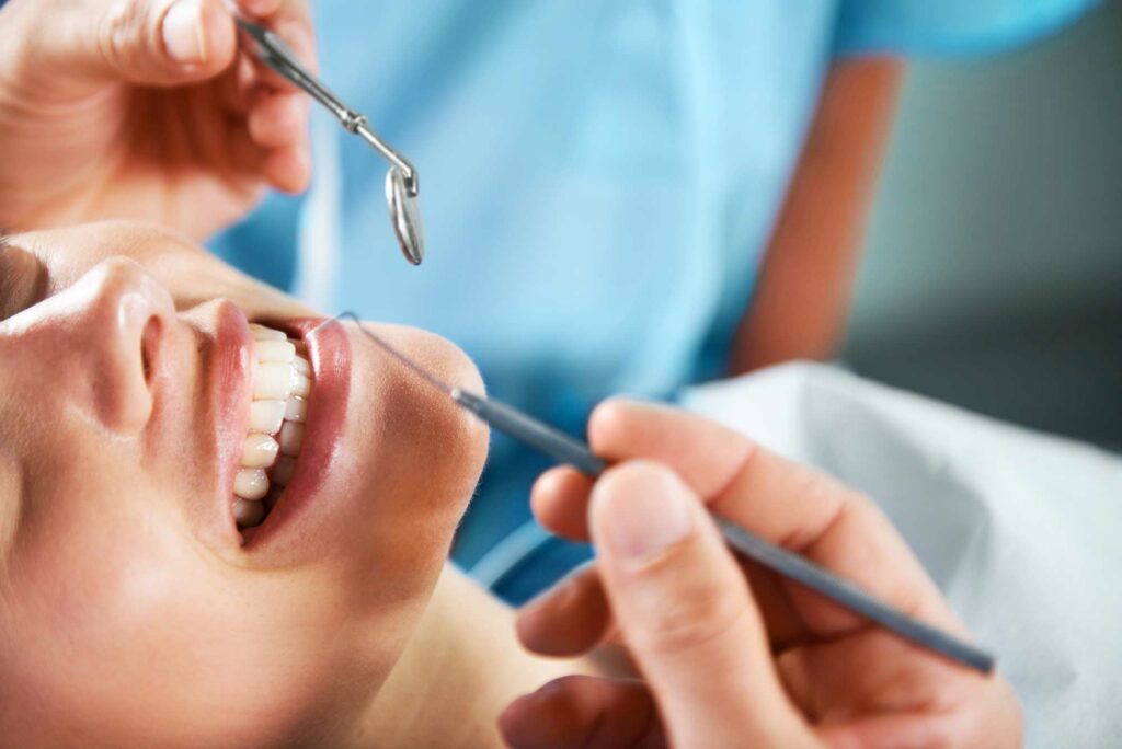 a women having her teeth checked