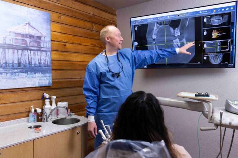 Dr. McKay showing a patient an x-ray